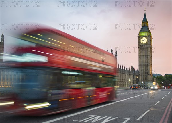 Red double-decker bus on the Westminster Bridge