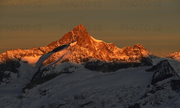 Zinalrothorn with snow at dawn