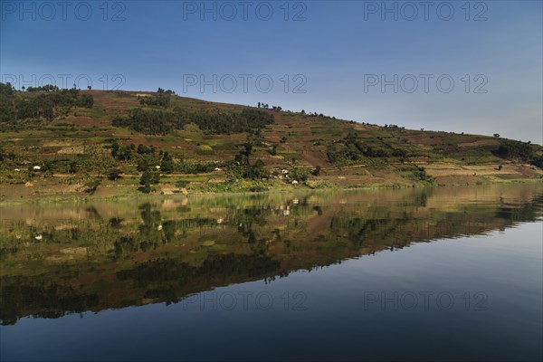 Hills reflecting on the water