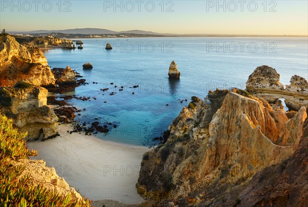 Beach and rocky coast Praia do Camilo