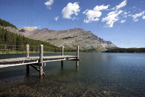 Wooden walkway on Swiftcurrent Lake