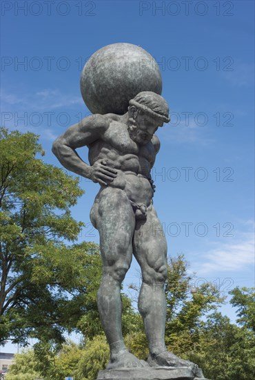 Statue of Atlas with globe on his shoulders