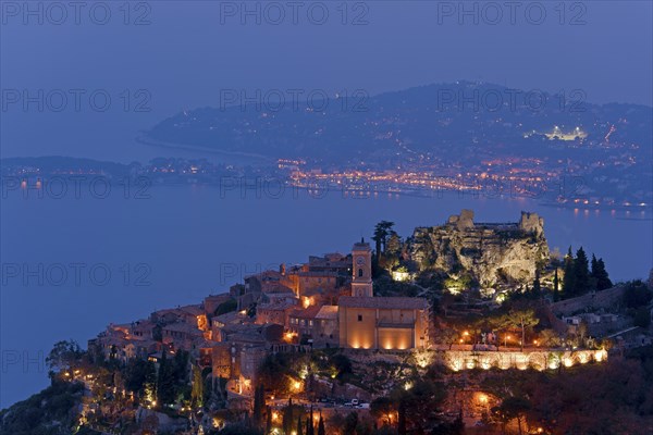 Flood-lit village with church