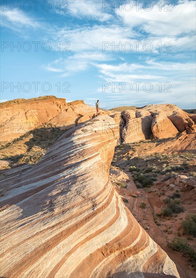 Young man on Fire Wave Rock