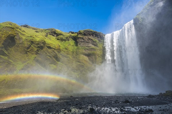 Waterfall Skogafoss with double rainbow