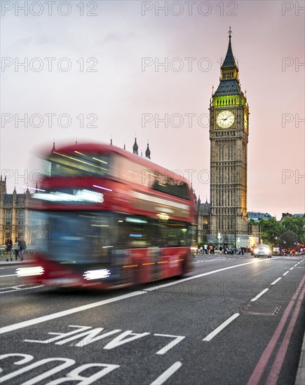 Red double-decker bus on the Westminster Bridge