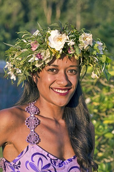 Young woman with flower wreath
