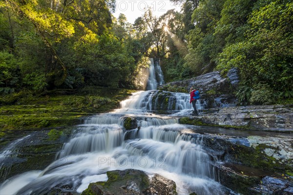 Hiker at McLean waterfall