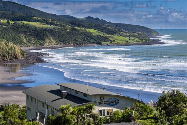 Surfers at Ngarunui Beach