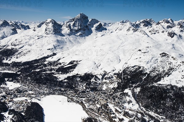 St.Moritz with St.Moritzsee in the winter mountains Piz Nair