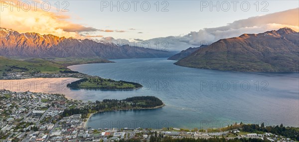 View of Lake Wakatipu and Queenstown at sunset