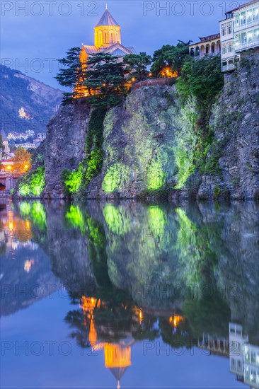 Metekhi Church on rock at Mtkvari River at dawn