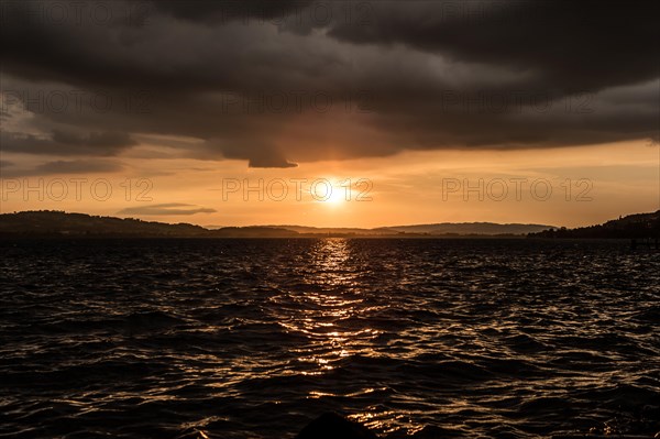 Sunset with clouds and stormy mood