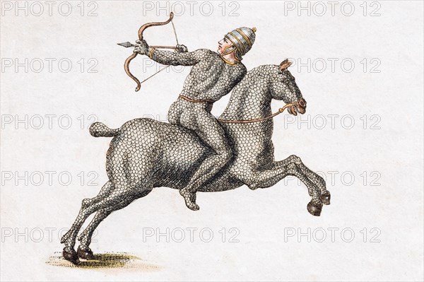 Horseman with bow and arrow in harness
