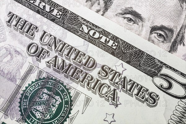 US five dollar bill and portrait of Abraham Lincoln