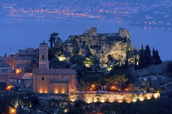 Flood-lit village with church