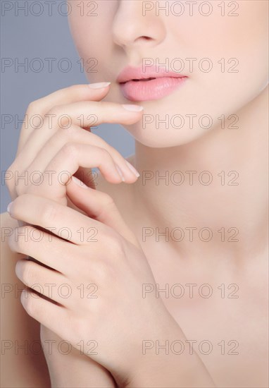 Hands of a young woman