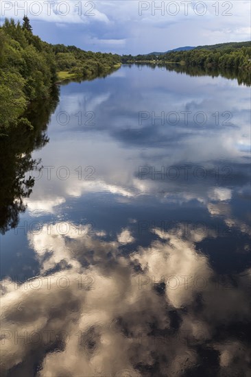 Reflection of clouds in river Klaralven