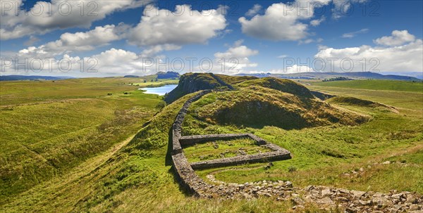 Hadrian's Wall with foundation walls of former watchtower
