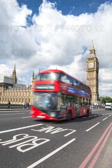 Red double-decker bus on the Westminster Bridge