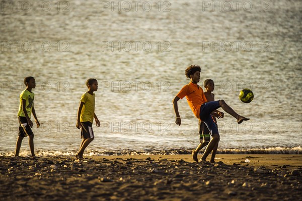 Teenager playing soccer