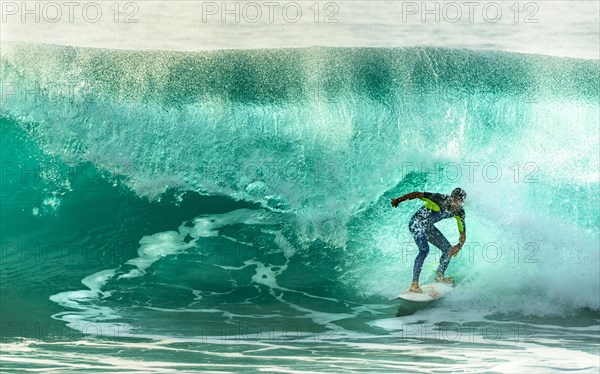 Surfer with large wave