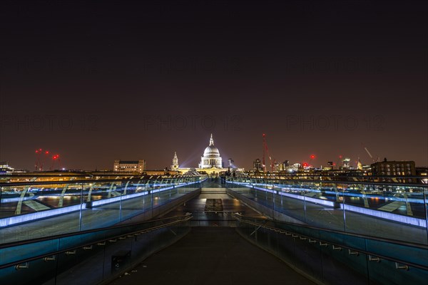 Illuminated Millennium Bridge and St. Paul's Cathedral