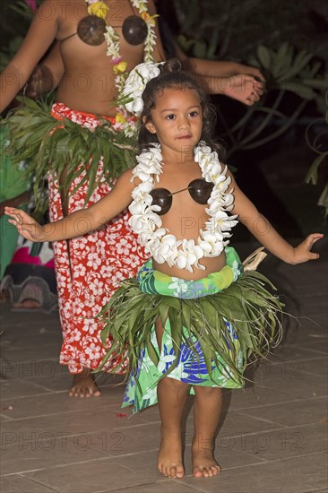 Little girl decorated with flowers