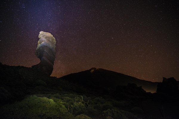 Roque Cinchado and Teide vulcano with starry sky