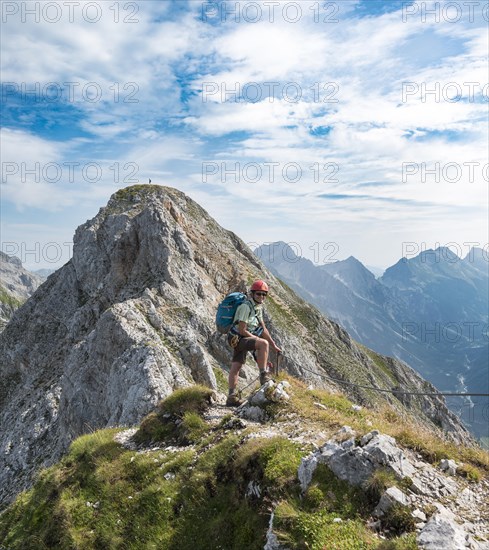 Hiker on via ferrata