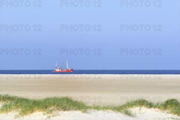 Red fishing boat in the North Sea