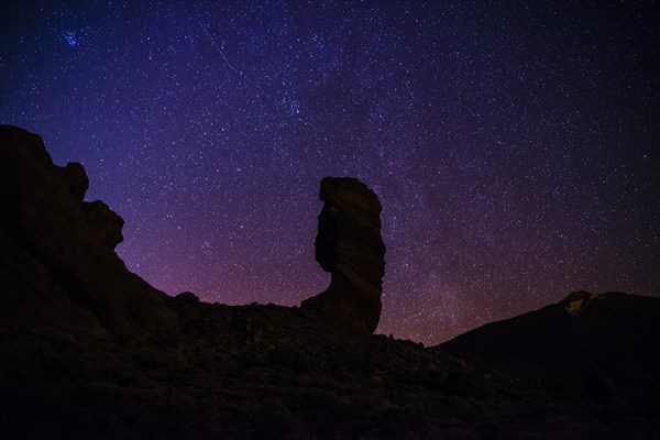 Roque Cinchado and Teide vulcano with starry sky