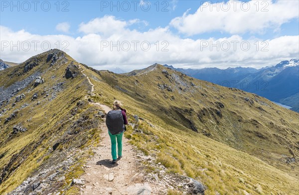 Female hiker on Kepler Track