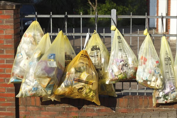 Yellow bags with plastic waste