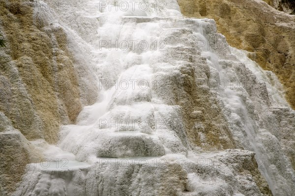 White mineral deposits