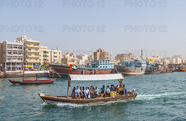Small traditional ships and old dhow on the creek