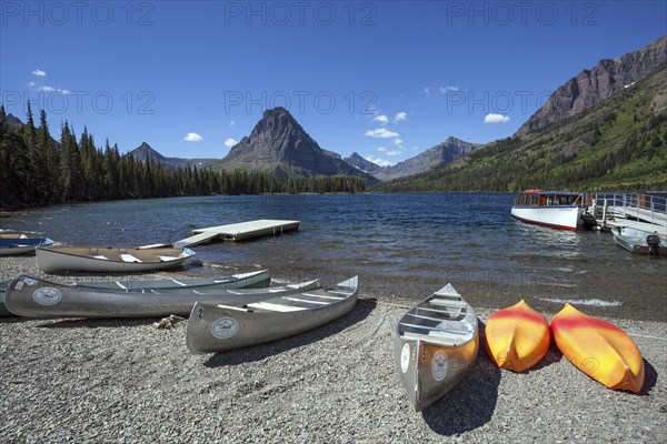 Canoes on the shore of Two Medicine Lake