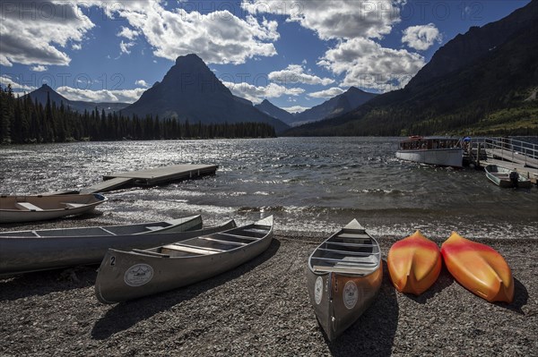 Canoes on the shore of Two Medicine Lake