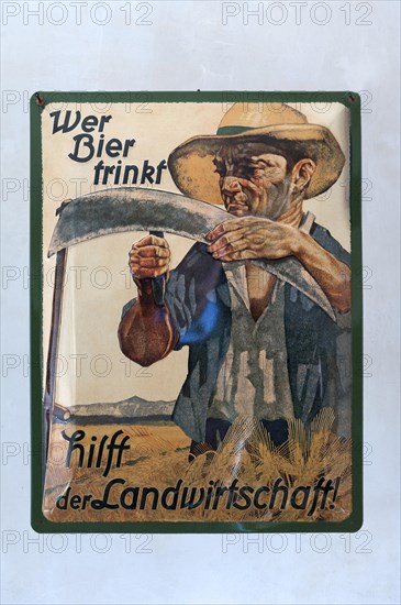 Vintage advertising sign made of sheet metal