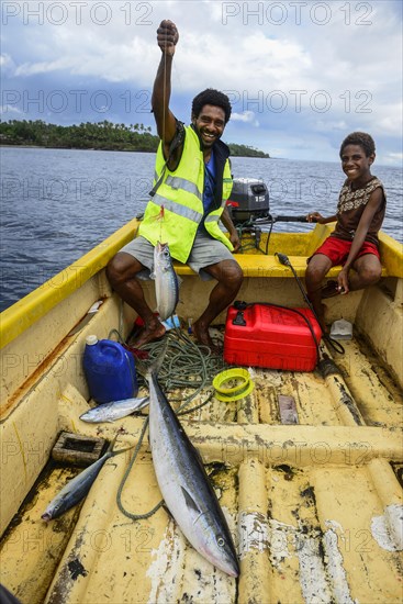 Fisherman in a boat while fishing