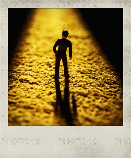 Polaroid effect of figurine and light