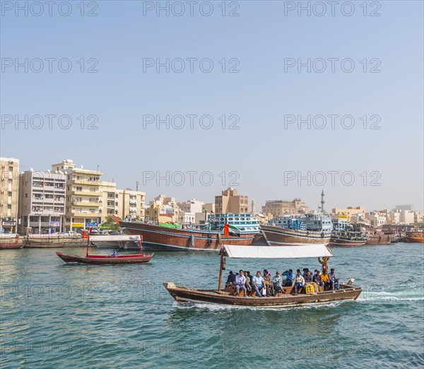 Small traditional ships and old dhow on the creek