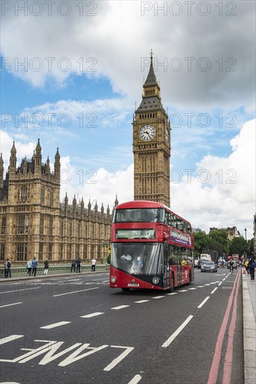 Red double-decker bus on the Westminster Bridge