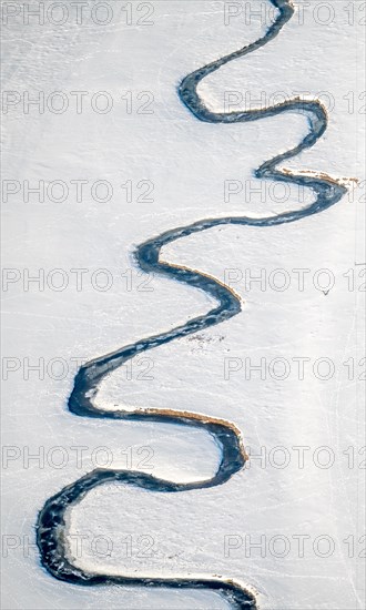 Meandering river Mohne in the snow