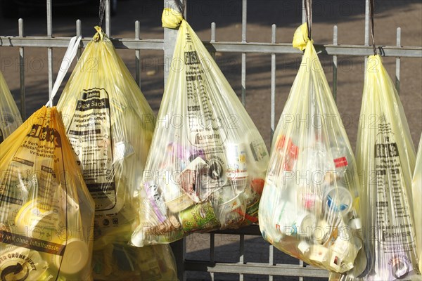 Yellow bags with plastic waste