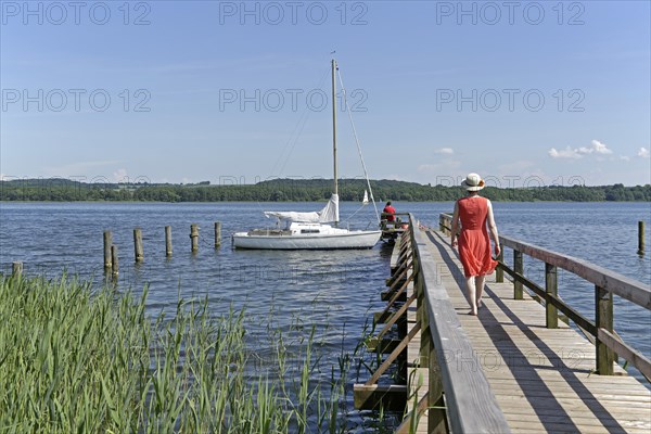 Woman on boat dock on Lake Ratzeburg