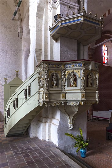 Wood-carved pulpit of the city church St. Jakob and St. Dionysius
