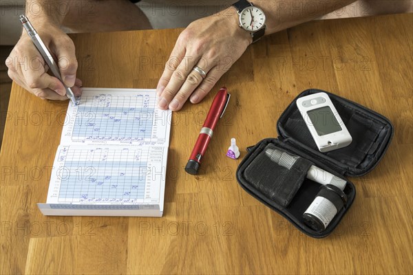 Diabetics keep his blood sugar diary