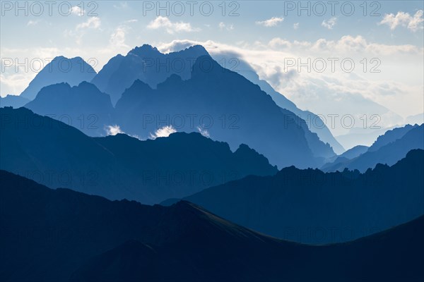 Ehrwald mountains in blue morning mist