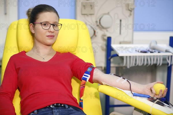 Patient taking a blood sample at the transfusion ward of a hospital